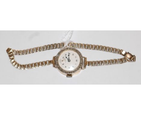 A ladies 18ct gold diamond set cocktail watch, having silvered dial with subsidiary seconds dial, within pavé set surround of