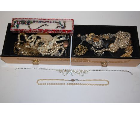 A jewellery box and contents to include; yellow metal locket, faux pearl choker, mixed costume jewellery etc 