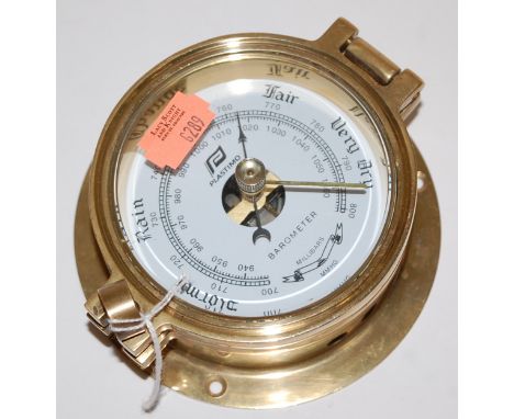 A modern Plastimo brass cased barometer