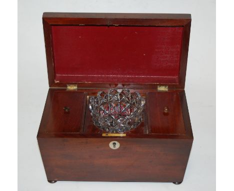 A Regency rosewood tea caddy of sarcophagus form, the hinged lid revealing a fitted interior