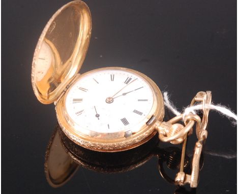 A continental 14ct gold ladies full hunter fob watch, having white enamel dial, subsidiary seconds dial (dial cracked), keyle