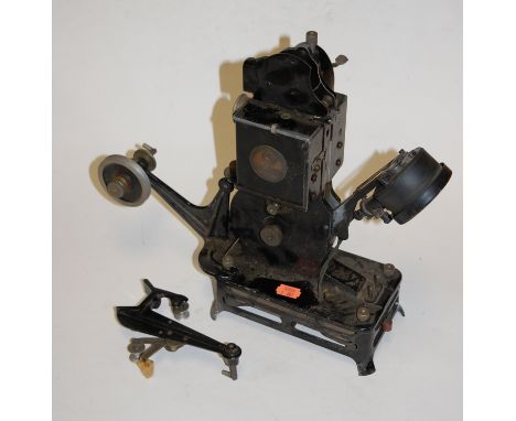 An early 20th century French Pathe Baby film projector