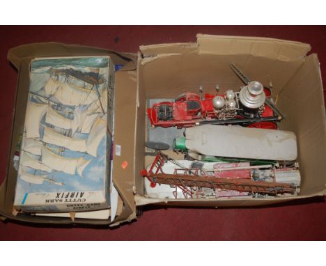Two boxes of mixed part-made plastic and wooden kits, to include vintage Shand Mason fire engine etc 