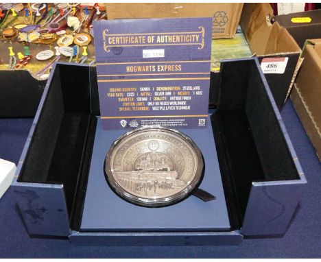 A Samoan silver 25 dollar coin, 2023, commemorating the Harry Potter Hogwarts Express, No. 17/99, boxed with certificate 