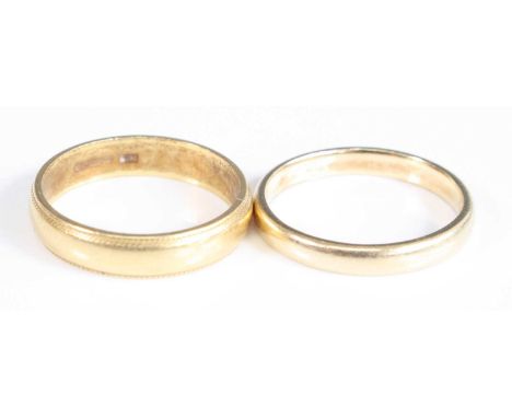 Two wedding rings, being an 18ct yellow gold 3.75mm D-shaped band with beaded edge, size J½, hallmarked 18ct, London 2007, sp