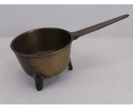 An 18th century bronze skillet