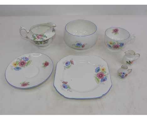 A Shelley floral pottery tea service, together with a Shelley floral milk jug, and two Coalport &amp; Spode miniature jugs 
