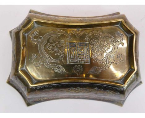 A Chinese brass censer, of shaped rectangular outline, decorated with dragons amongst clouds, impressed seal mark to undersid