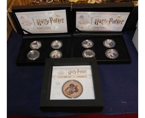 A Harry Potter The Teacher's silver 50p commemorative coin set, boxed with certificate; together with a Harry Potter The Stud