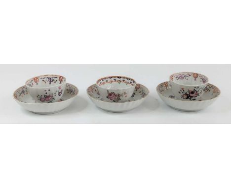 Three New Hall porcelain tea bowls and saucers, late 18th century, enamel decorated with flowers, saucer dia.12.5cmOne tea bo