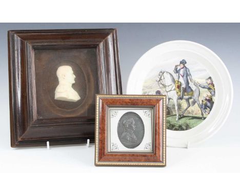 A cast resin profile portrait bust of Napoleon Bonaparte, within a mahogany frame, 23 x 23cm, together with various other Nap