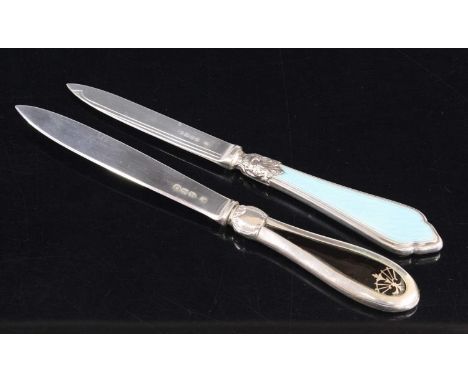 A Victorian letter opener, having a silver blade with embossed white metal collar and blue guilloche enamel handle, maker Wil