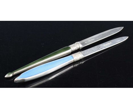 A William IV letter opener, the silver blade engraved with flowers, having a silver collar and blue guilloche enamel handle, 