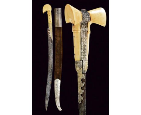 dating: 19th Century provenance: Turkey, Curved, flat, single-edged blade with Arabic inscriptions and silver-inlaid floral m