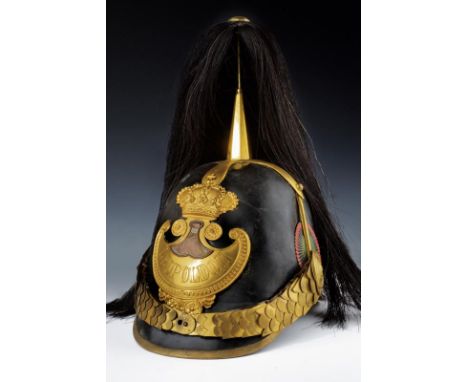 dating: Second half of the 19th Century provenance: Grand Duchy of Tuscany, Black leather skull with gilded mounts. Front bad