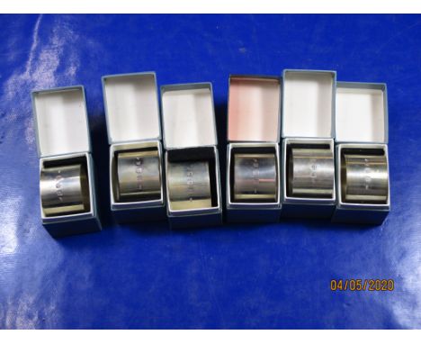 Collection of six boxed hallmarked silver Napkin Rings