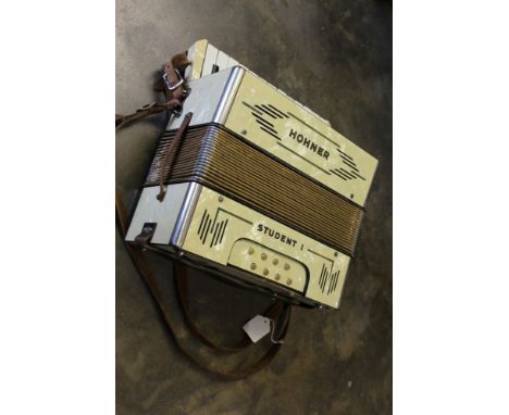 Hohner 'Student' accordion, together with a booklet 'A Tune a Day - Accordion' book 1 (2)