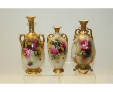 Royal Worcester two-handled vase hand decorated with roses, signed - J. Flexman, together with another similar, signed - E. S