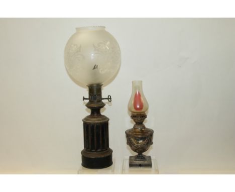 Silver plated oil lamp in the Adam style, now converted to electricity, another in the form of a classical column, with etche