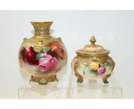 Royal Worcester pot pourri vase of cauldron form raised on three scrolled feet together with a Royal Worcester vase of spheri