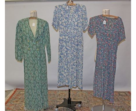 Six ladies' 1930s / 1940s vintage day dresses - mainly floral printed fabrics, also a cotton paisley full-length housecoat / 