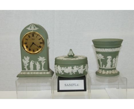 Group of green Wedgwood Jasper ware - including a mantel clock, vases, pots, bell and one yellow vase   CONDITION REPORT  All