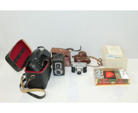 Quantity of cameras and photographic equipment - including a Rolleiflex TLR camera, a Pentax Spotmatic with three interchange
