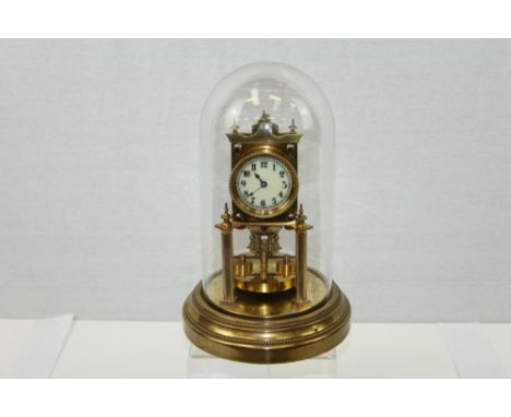 Early 20th century German four hundred day Anniversary clock with spring-driven movement and disc pendulum, white enamel dial