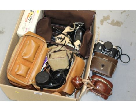 Quantity of cameras and photographic equipment - including Nikon EM SLR camera and accessories, in Nikon logo bag, Pentax Spo