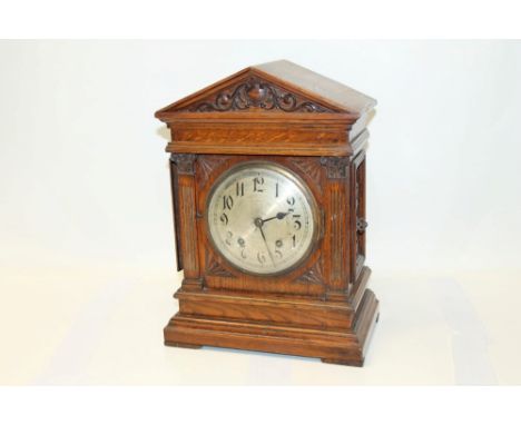 19th mantel clock with German eight day movement, signed - 'W. & H. Sch 5', striking on two gongs and concave silvered dial w