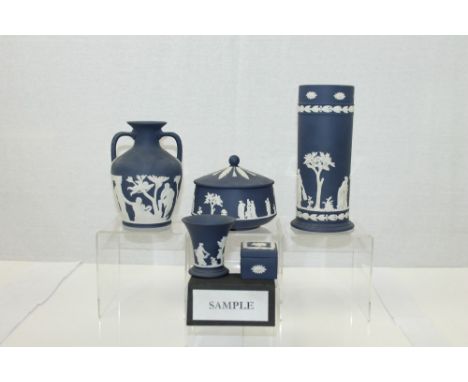 Group of navy blue Wedgwood Jasper ware - including pair candlesticks, vases, trinket boxes and a long pin dish   CONDITION R