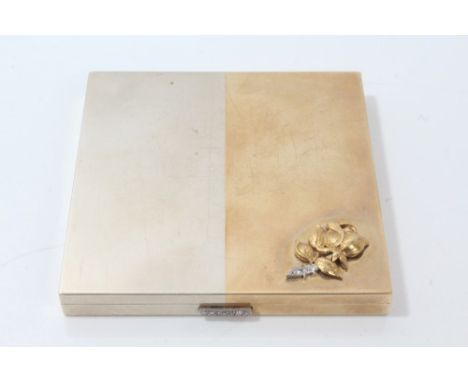 Asprey & Co. gold (9ct) powder compact, one half white gold, other half yellow gold, mounted with a rose set with three singl