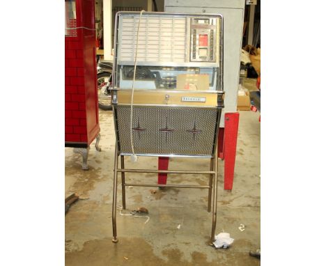 Rock-Ola Juke Box - with metal stand - manufactured by Rock-Ola MFG Corp. Chicago, Illinois, U.S.A. - chrome fittings, with s