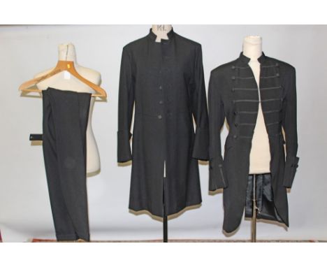 Gentlemen's black wool frock priest coat, in gothic styling, double breasted, stand-up collar, braiding and deep turn up cuff