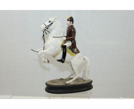 Beswick rearing Lipizzaner Horse with rider, model no. 2467, approximately 24cm high   CONDITION REPORT  Leather reins are br