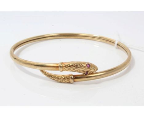 Gold (9ct) snake torque bangle with ruby eyes   CONDITION REPORT  Total gross weight approximately 10.9 grams