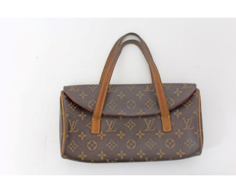 Louis Vuitton vintage handbag, leather handles, red suede lining and interior pocket and press stud fastening, 28cm wide, 17c