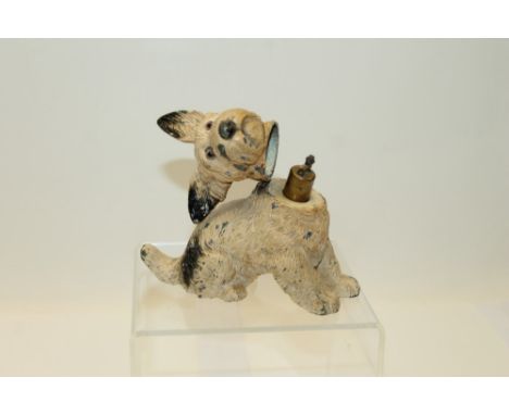 Early 20th century table lighter in the form of a spelter Scottie dog with hinged head with glass eyes