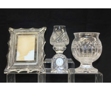 Waterford crystal clock together with a Waterford crystal pedestal urn, a tea light holder and a glass photograph frame (fram