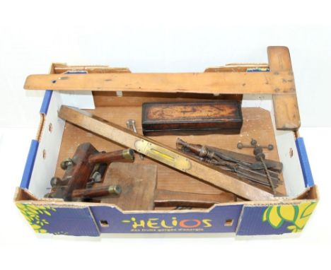 Collection of vintage tools - including side moulding plane, spirit level, mallet, sharpening stone, Archimedes drill, T-squa