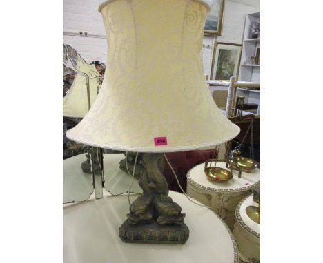 An early 20th century table lamp in the form of fish, together with a cream shade 