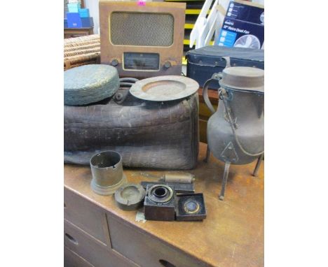 A vintage leather Gladstone bag with crocodile skin effect, a vintage Pye radio, mixed metal ware and a travelling inkwell 