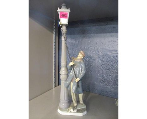 A Lladro figurine of a street lighter, 18 3/4"h 