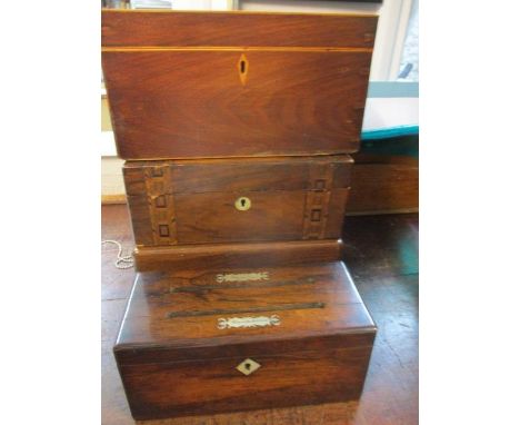 An early 19th century mahogany tea caddy, two small wooden boxes and a mahogany letter box with mother of pearl insets 