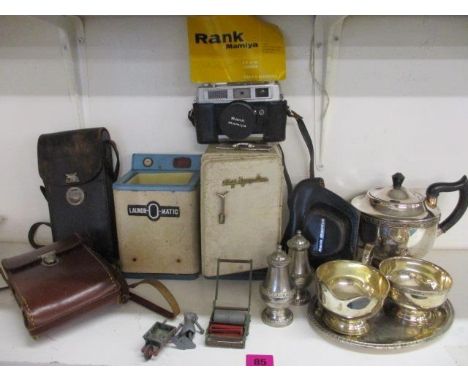 A mixed lot to include silver plate, Kodak cameras, lead toys and vintage child's enamelled kitchen white goods 