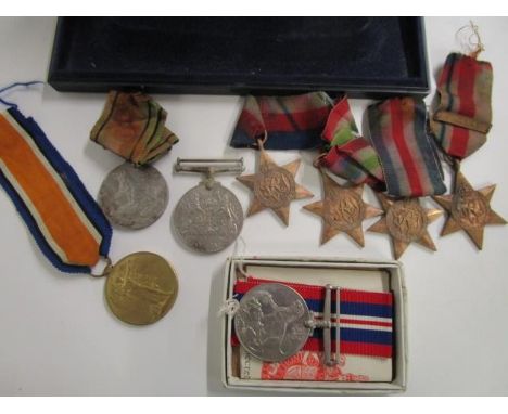 A group of WWII medals and a WWI model named to 3416 A H Brandon R War r
