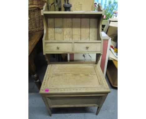 A pine side cabinet with hinged lid on square, tapering legs, 20" x 22 3/8" x 15 3/8" and a pine wall hanging wall shelf with