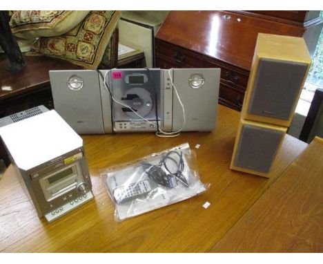 A Panasonic CD stereo system, model SCPM07, along with instruction, together with a Phillips compact radio/CD player 