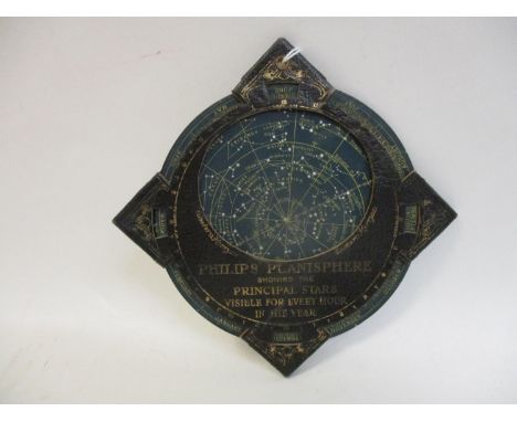 A Philips Planisphere astronomical star chart in tooled, gilt, black leather and card, 4 1/2" sq 