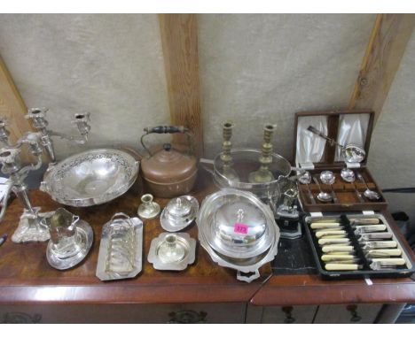 Silver plate and metalware to include cutlery, a candelabra, a teapot, an Art Deco Ronson lighter and other items 